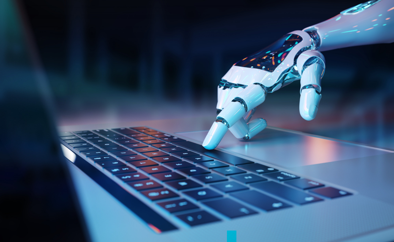 Faculdade de Inteligência Artificial: imagem de uma mão de robô tocando o teclado de um notebook aberto em cima de uma mesa.